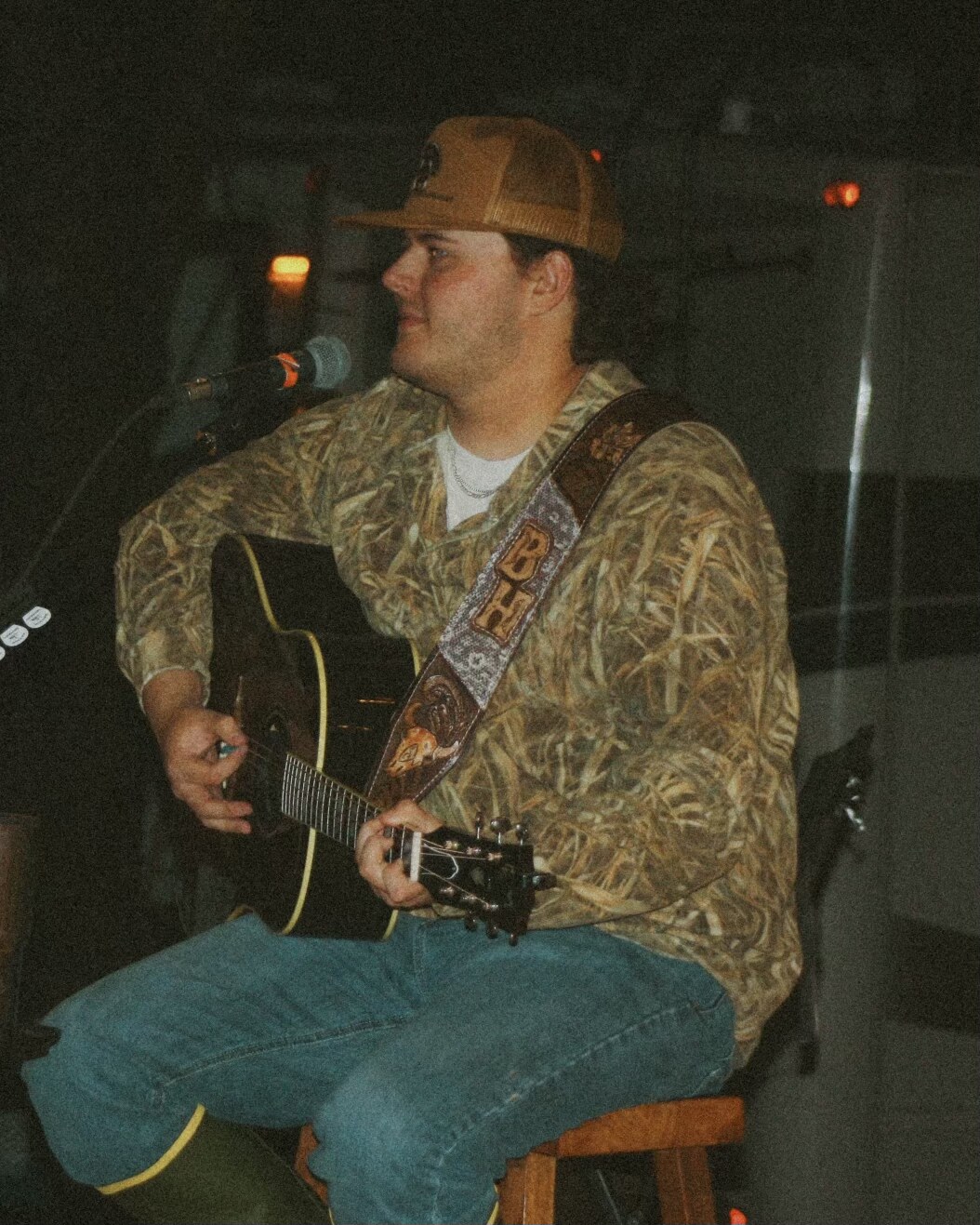 Bryson Howard with acoustic guitar